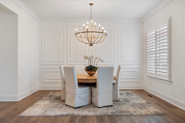 dining space featuring a chandelier, dark hardwood / wood-style floors, and ornamental molding