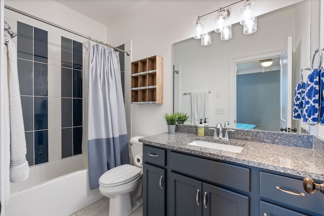 full bathroom with tile patterned flooring, shower / tub combo, vanity, and toilet