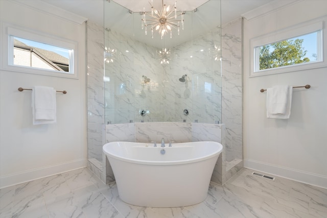 bathroom with shower with separate bathtub and a notable chandelier