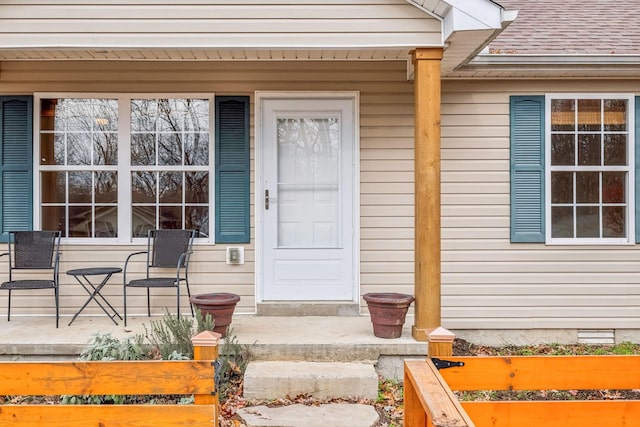 entrance to property with covered porch