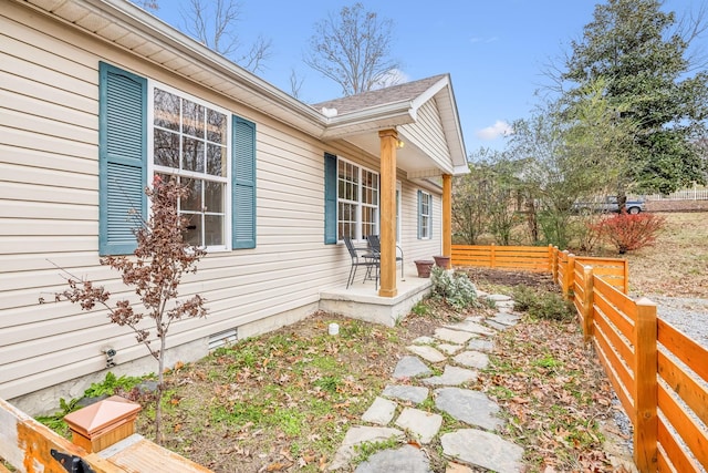 view of home's exterior with a porch