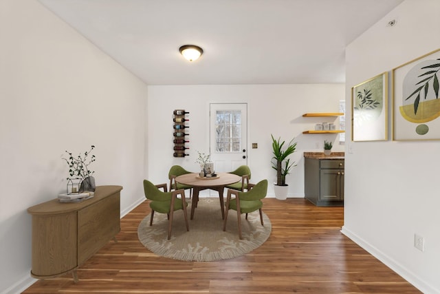 dining room featuring dark hardwood / wood-style flooring