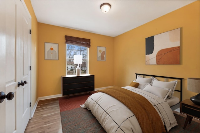 bedroom featuring light hardwood / wood-style flooring