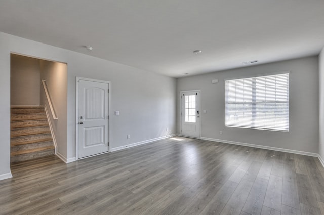 empty room featuring hardwood / wood-style flooring