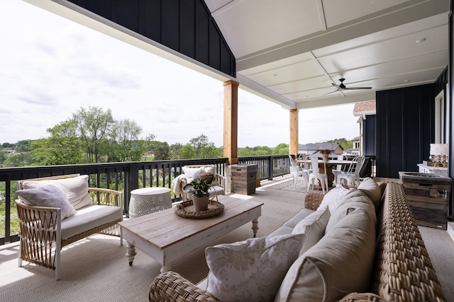 exterior space with ceiling fan and an outdoor hangout area