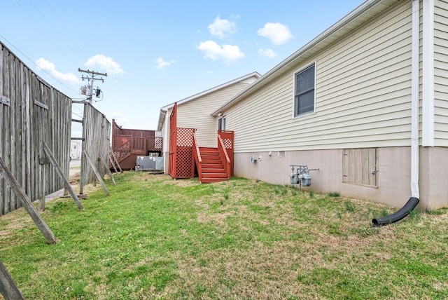 view of yard featuring a wooden deck