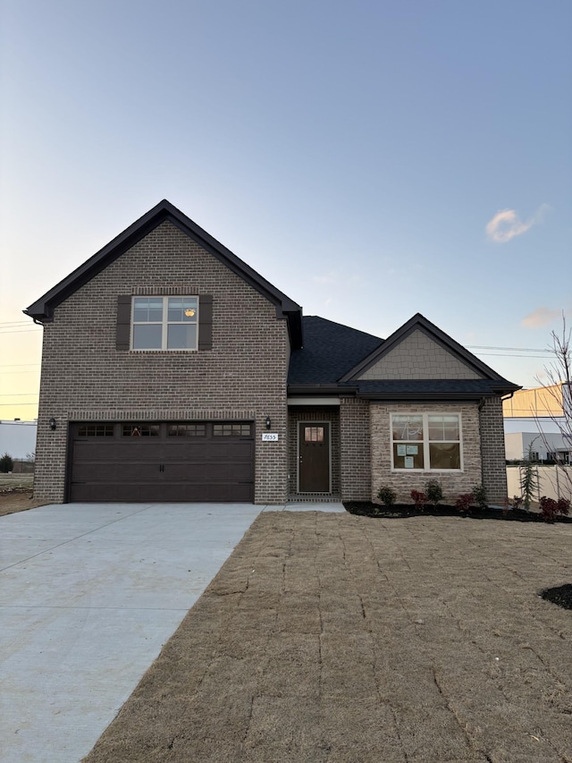 view of front of home with a garage