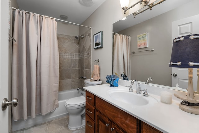 full bathroom featuring tile patterned flooring, vanity, shower / bath combo, and toilet