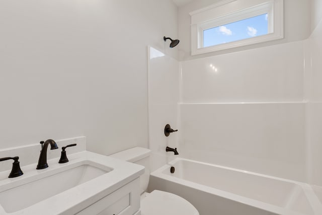 full bathroom with vanity,  shower combination, and toilet