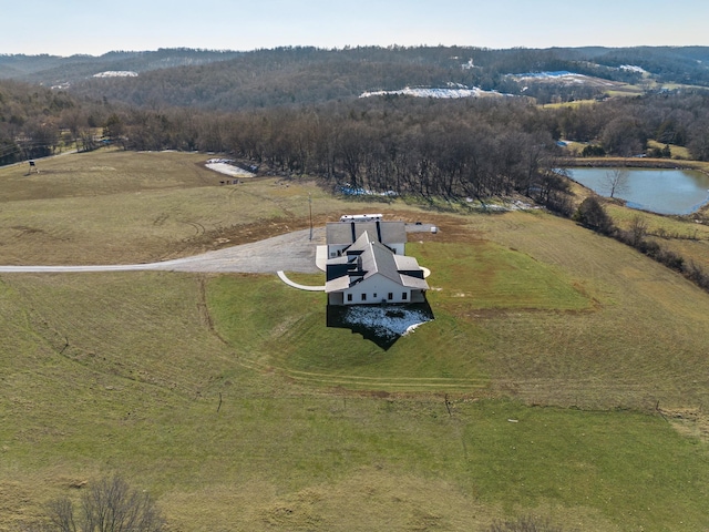 drone / aerial view with a rural view and a water view