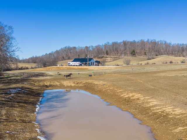 property view of water with a rural view