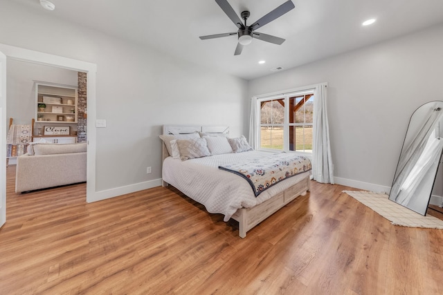 bedroom featuring ceiling fan and light wood-type flooring