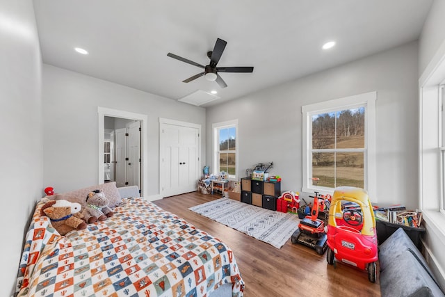 bedroom featuring ceiling fan and hardwood / wood-style floors