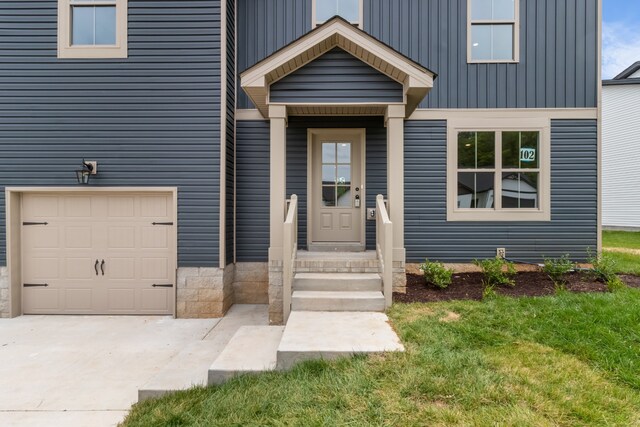 property entrance featuring a garage