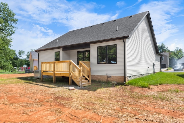 back of house featuring a deck