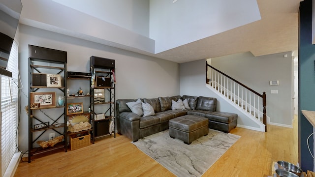 living room with light hardwood / wood-style flooring