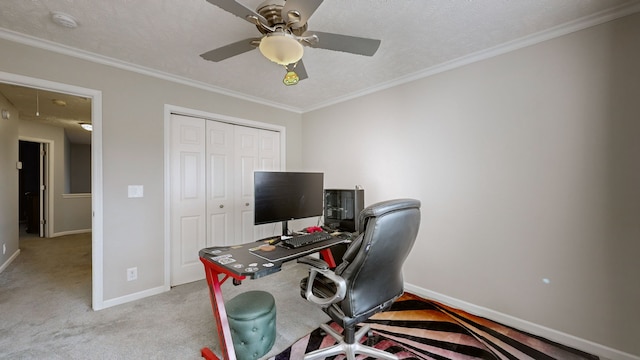 office space with light carpet, a textured ceiling, ceiling fan, and ornamental molding