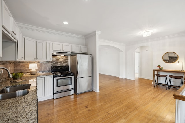 kitchen with white cabinets, sink, and appliances with stainless steel finishes