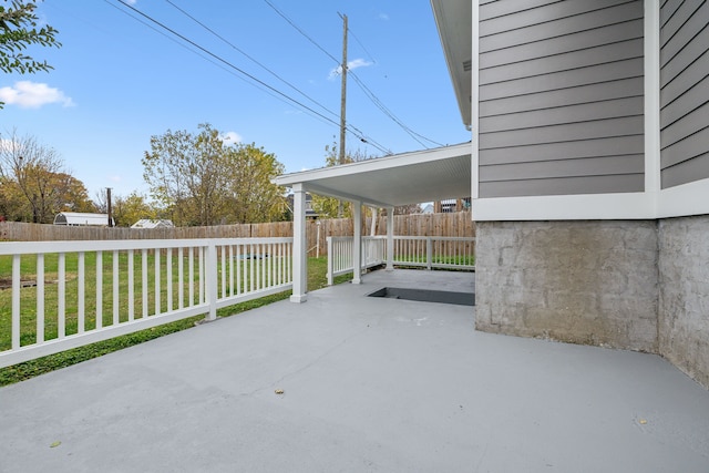 view of patio / terrace featuring a carport