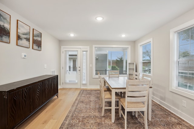 dining area with light wood-type flooring