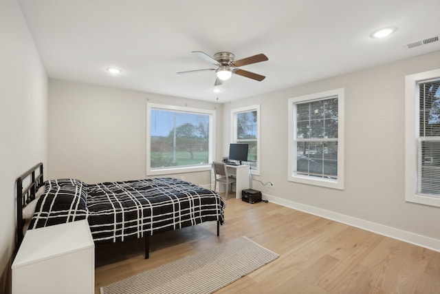 bedroom featuring ceiling fan and wood-type flooring