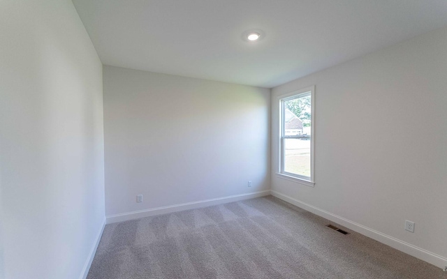 7938 Pine St, Fairview, TN 37062 - empty room with baseboards and light carpet