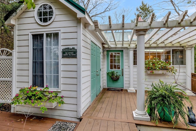 view of outdoor structure with a pergola