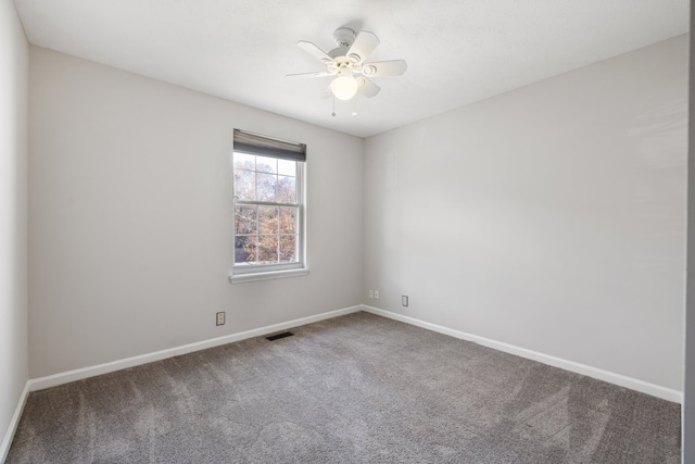 carpeted empty room with ceiling fan