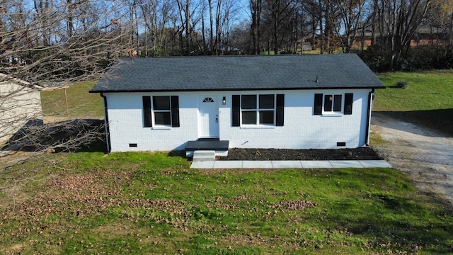 view of front of home with a front lawn