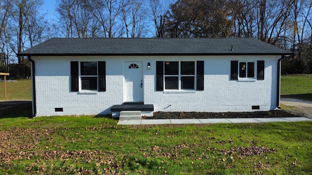 single story home with a front yard