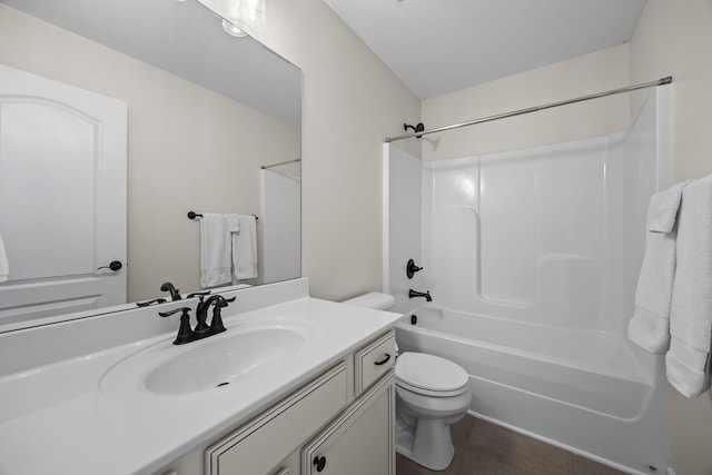 full bathroom featuring vanity, toilet, and tub / shower combination