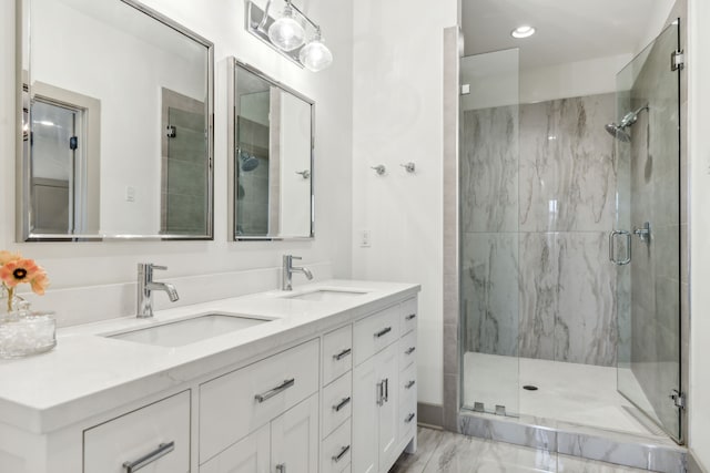 bathroom with vanity and walk in shower