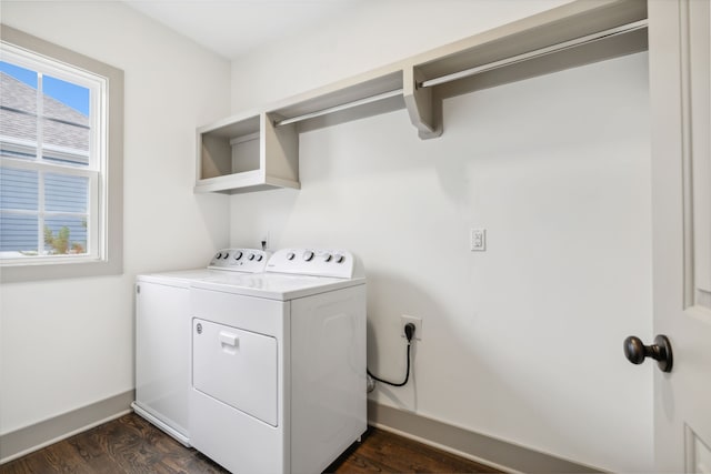 washroom featuring washer and clothes dryer and dark hardwood / wood-style flooring