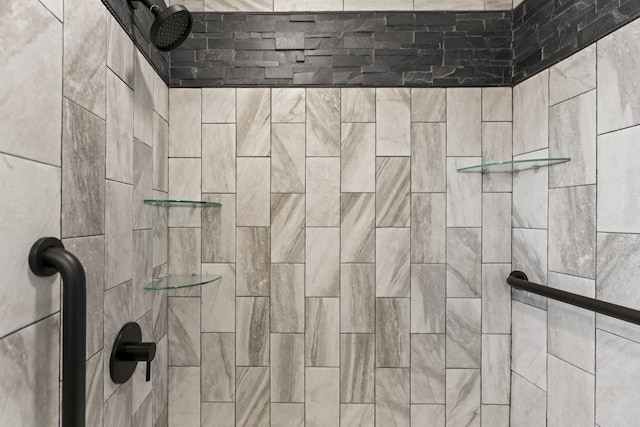 room details with a tile shower