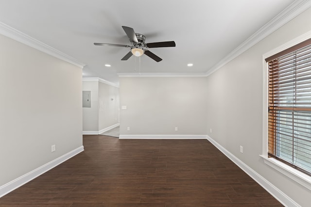 unfurnished room with ceiling fan, dark wood-type flooring, and ornamental molding