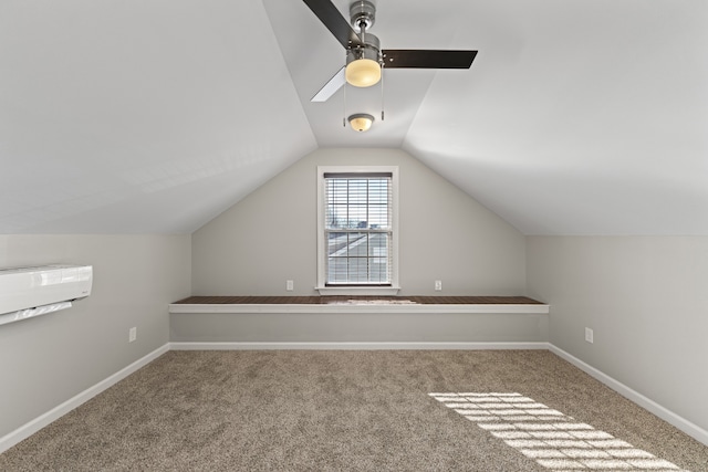 additional living space with ceiling fan, carpet, and lofted ceiling