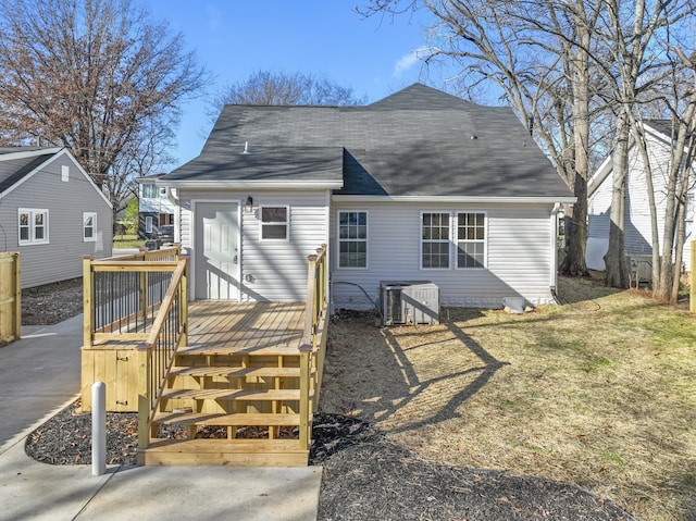 view of front facade with a deck and central AC