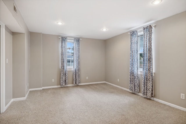 spare room featuring carpet flooring