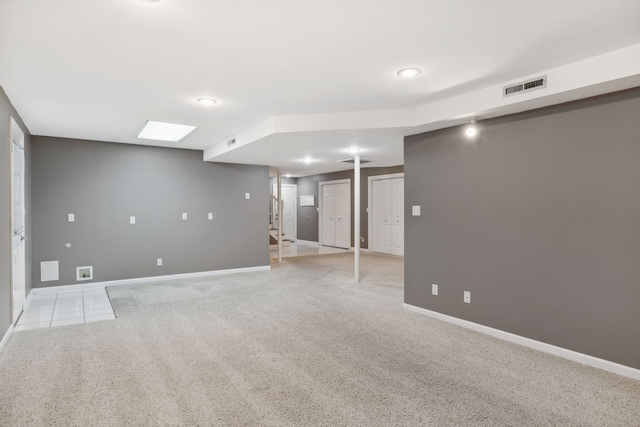 basement with light carpet