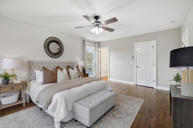 bedroom featuring dark hardwood / wood-style flooring and ceiling fan