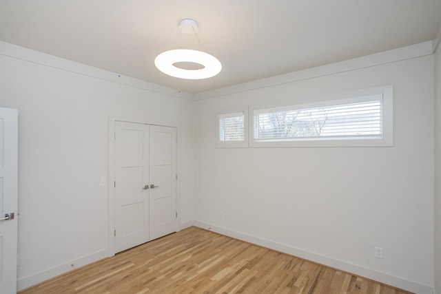 unfurnished room featuring light hardwood / wood-style floors