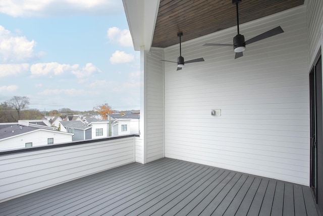 wooden deck with ceiling fan