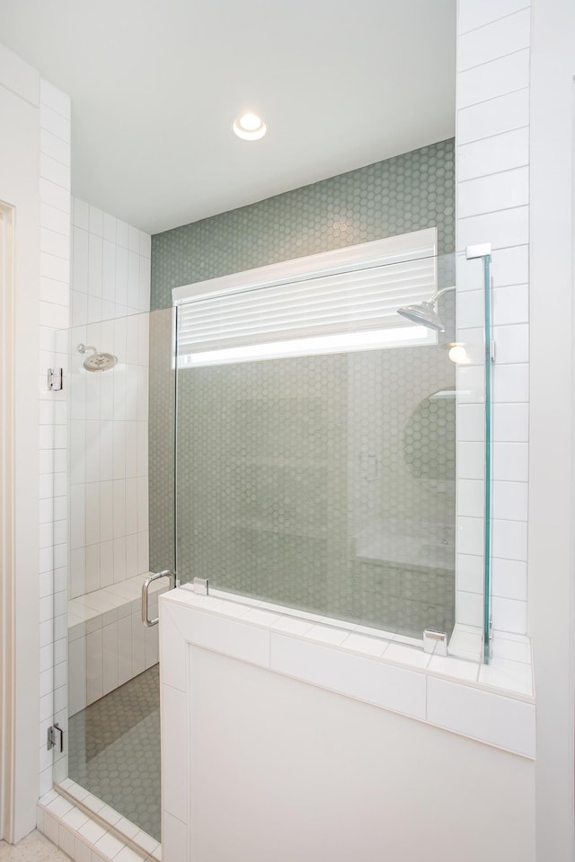 bathroom featuring walk in shower