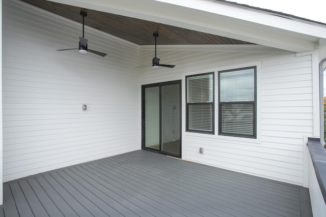 wooden terrace featuring ceiling fan