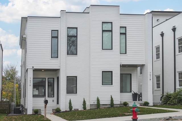 view of front facade featuring cooling unit