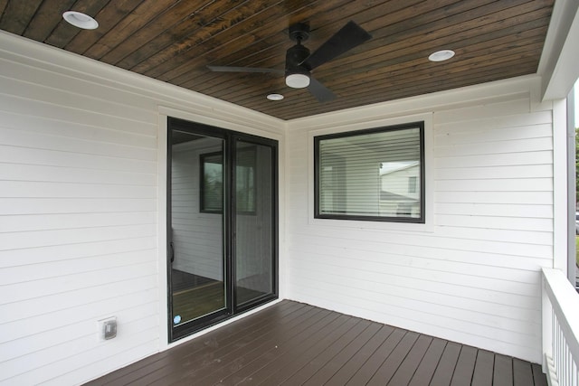 wooden deck with ceiling fan