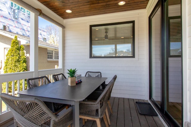 sunroom featuring wood ceiling