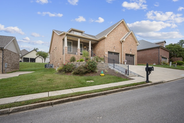 view of front of property with a porch, a garage, and a front lawn