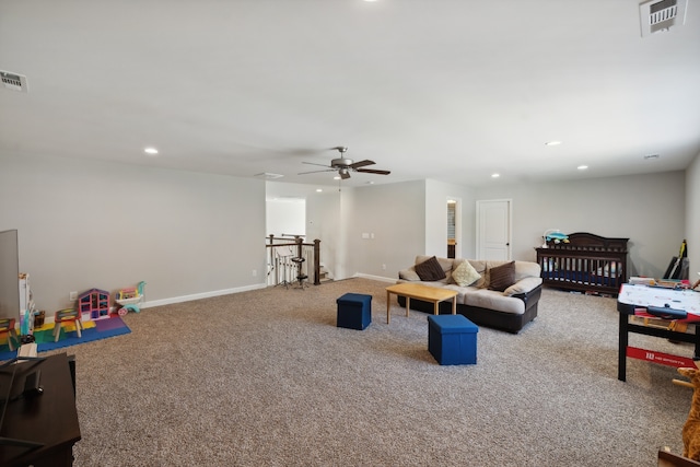 playroom with carpet flooring and ceiling fan