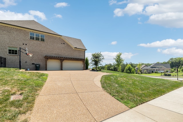 view of side of home featuring a lawn